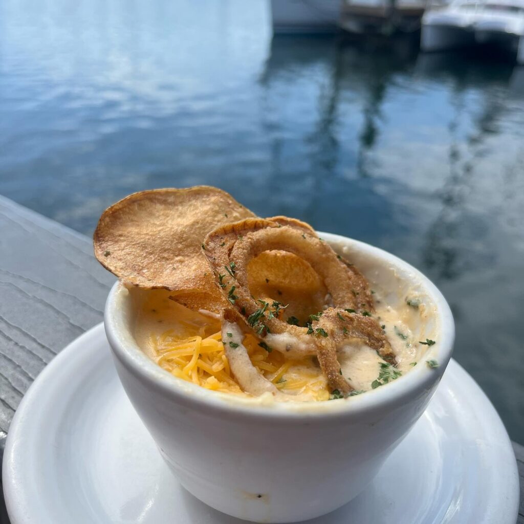 Bayou Joe's On Massalina Bayou soup eith fried onion on the waterfront | waterfront restaurant in Panama City, Florida offering breakfast, lunch & dinner with a view