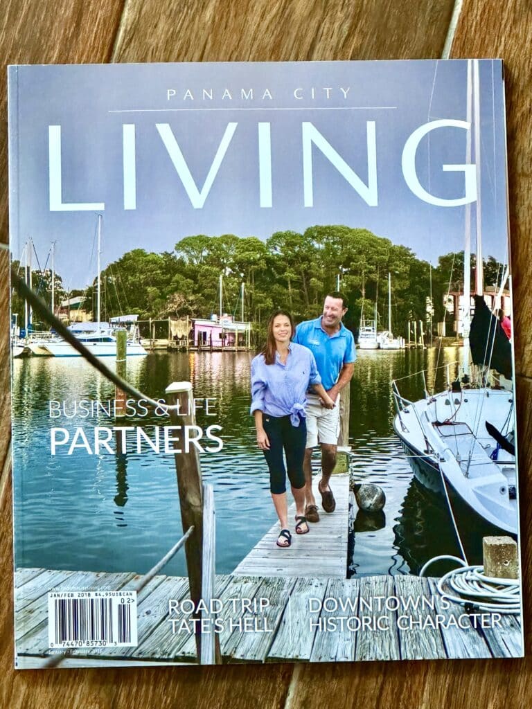 Bayou Joe's On Massalina Bayou owners on the cover of Panama City Living magazine | waterfront restaurant in Panama City, Florida offering breakfast, lunch & dinner with a view